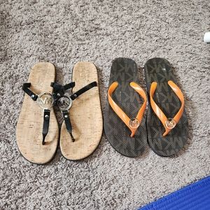 1 pair of Michael Kors flip flops Black Is Sold